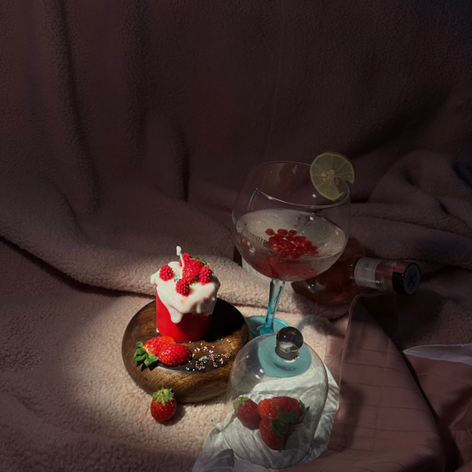PASTRY CANDLE TOPPED WITH BERRIES